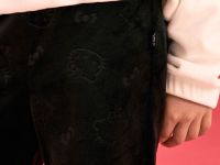 Чёрные спортивные брюки клёш из велюра с принтом Hello Kitty для девочки Глория Джинс