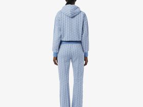 Женские расклешенные спортивные брюки Lacoste с монограммой