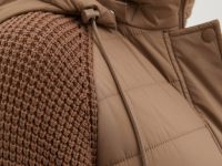 Утепленное полупальто с вязаными рукавами