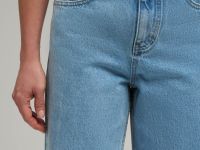 Джинсы расклешенного кроя