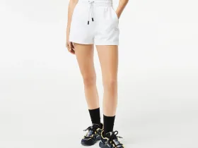 Женские однотонные шорты Lacoste