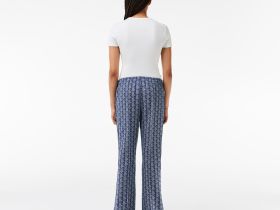 Женские расклешенные спортивные брюки Lacoste с монограммой