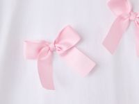 Белая футболка оверсайз с сатиновыми бантиками для девочки Глория Джинс