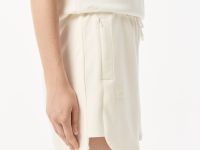 Женские спортивные шорты Lacoste с карманами