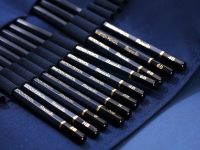 Набор для скетчинга Finenolo карандаши, ластики, аксессуары 27 предметов в пенале-свитке