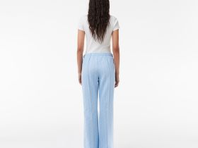 Женские расклешенные спортивные брюки Lacoste с монограммой