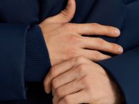 Утепленное пальто с накладными карманами