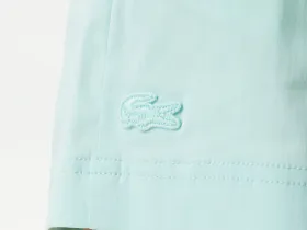 Женские короткие однотонные шорты Lacoste