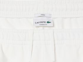 Хлопковые спортивные брюки Lacoste унисекс