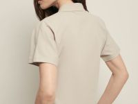 Поло приталенного силуэта с вышивкой