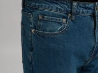 Джинсы прилегающего кроя