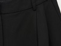 Брюки с защипами