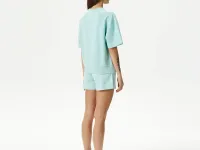 Женские короткие однотонные шорты Lacoste