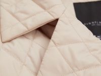 Стеганое утепленное пальто с поясом