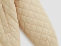 Стеганая куртка с высоким воротником