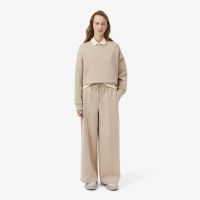 Женские хлопковые спортивные брюки-клёш Lacoste