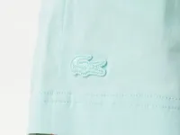 Женские короткие однотонные шорты Lacoste