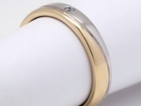 Кольцо из комбинированного золота с бриллиантом э1001кц05161500