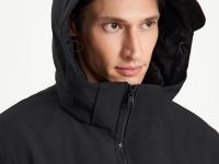 Пуховое пальто с накладными карманами