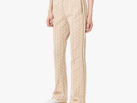 Женские расклешенные спортивные брюки Lacoste с монограммой