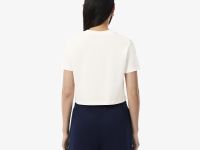 Женская укороченная хлопковая футболка свободного кроя с нашивкой Lacoste