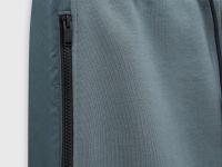 Спортивные брюки свободного силуэта с контрастной отделкой