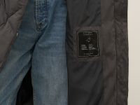 Пуховое пальто из водонепроницаемой ткани