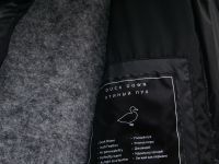 Стеганое пуховое пальто силуэта oversize