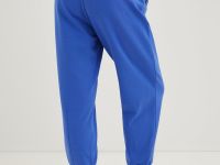 Спортивные брюки зауженного кроя на резинке