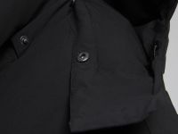 Пуховое пальто с накладными карманами