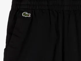 Детские эластичные хлопковые штаны Lacoste