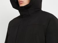 Пуховое полупальто с накладными карманами и капюшоном