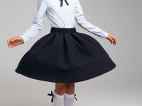 Трикотажная блузка с бантом