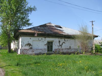 Здание первой сельской школы, основанной в 1900 году