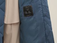 Пуховое пальто из водонепроницаемой ткани