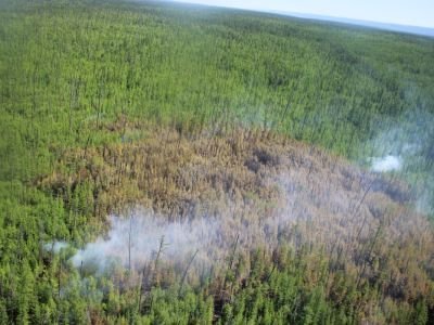 В Верхоянском районе Якутии локализовали угрожавший селу пожар