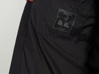 Пуховое полупальто из водонепроницаемой ткани