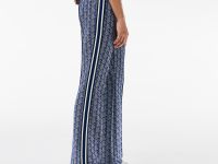 Женские расклешенные спортивные брюки Lacoste с монограммой