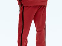 Спортивные брюки свободного силуэта с контрастной отделкой