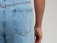 Джинсы flared fit