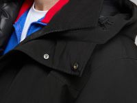 Пуховое полупальто с накладными карманами и капюшоном