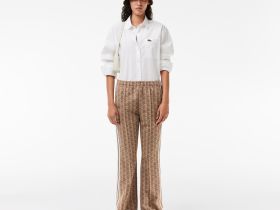 Женские расклешенные спортивные брюки Lacoste с монограммой