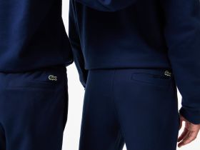 Спортивные хлопковые брюки Lacoste унисекс