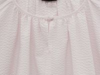 Блузка с округлым вырезом свободного силуэта