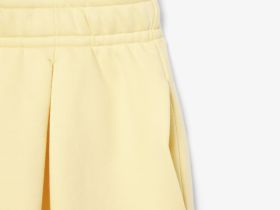 Женские плиссированные флисовые шорты Lacoste