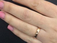 Гладкое кольцо из красного золота с бриллиантом э0201кц08110300