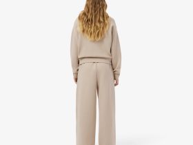 Женские хлопковые спортивные брюки-клёш Lacoste