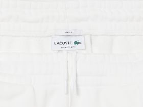 Спортивные хлопковые брюки Lacoste унисекс свободного кроя