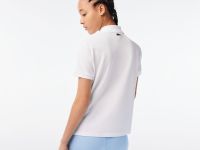 Женское поло Lacoste