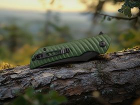 Нож складной Ruike P123-MG, сталь 14C28N, рукоять микарта, зеленый